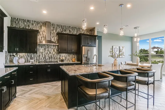 a kitchen with granite countertop a sink and counter space
