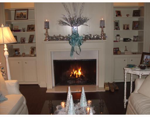 3535 Santa Fe Street, Unit 46 Corpus Christi, TX 78411 - Photo 2 of 4 a living room with furniture and a fireplace