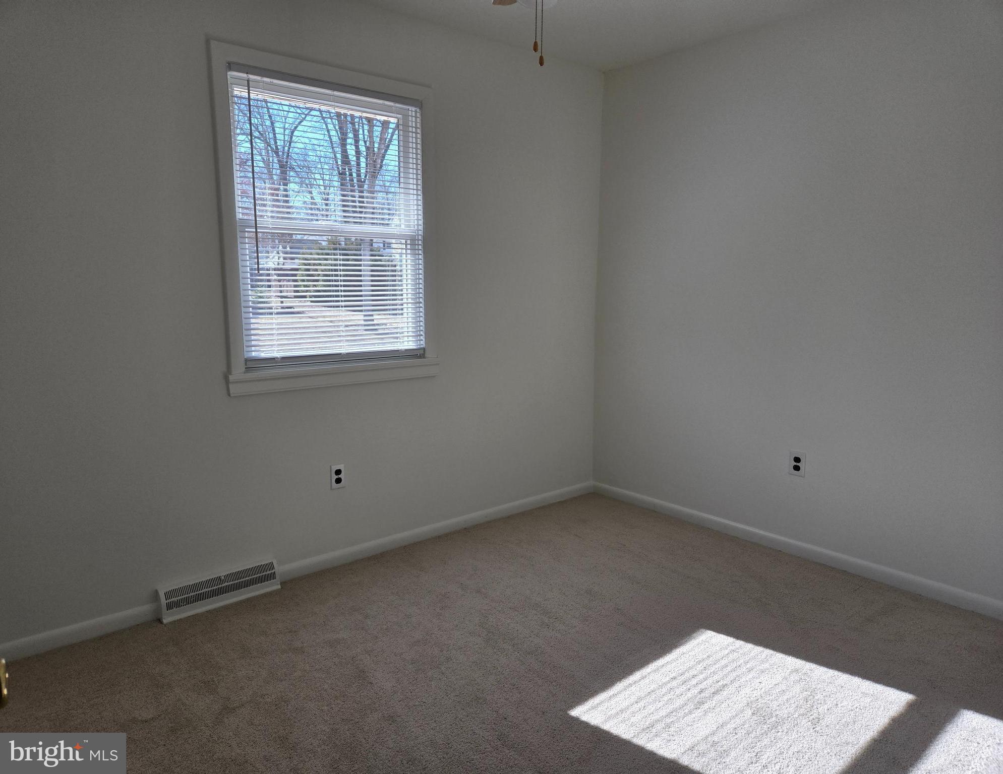 8 Sandy Drive Newfield, NJ 08344 - Photo 12 of 48 an empty room with a window