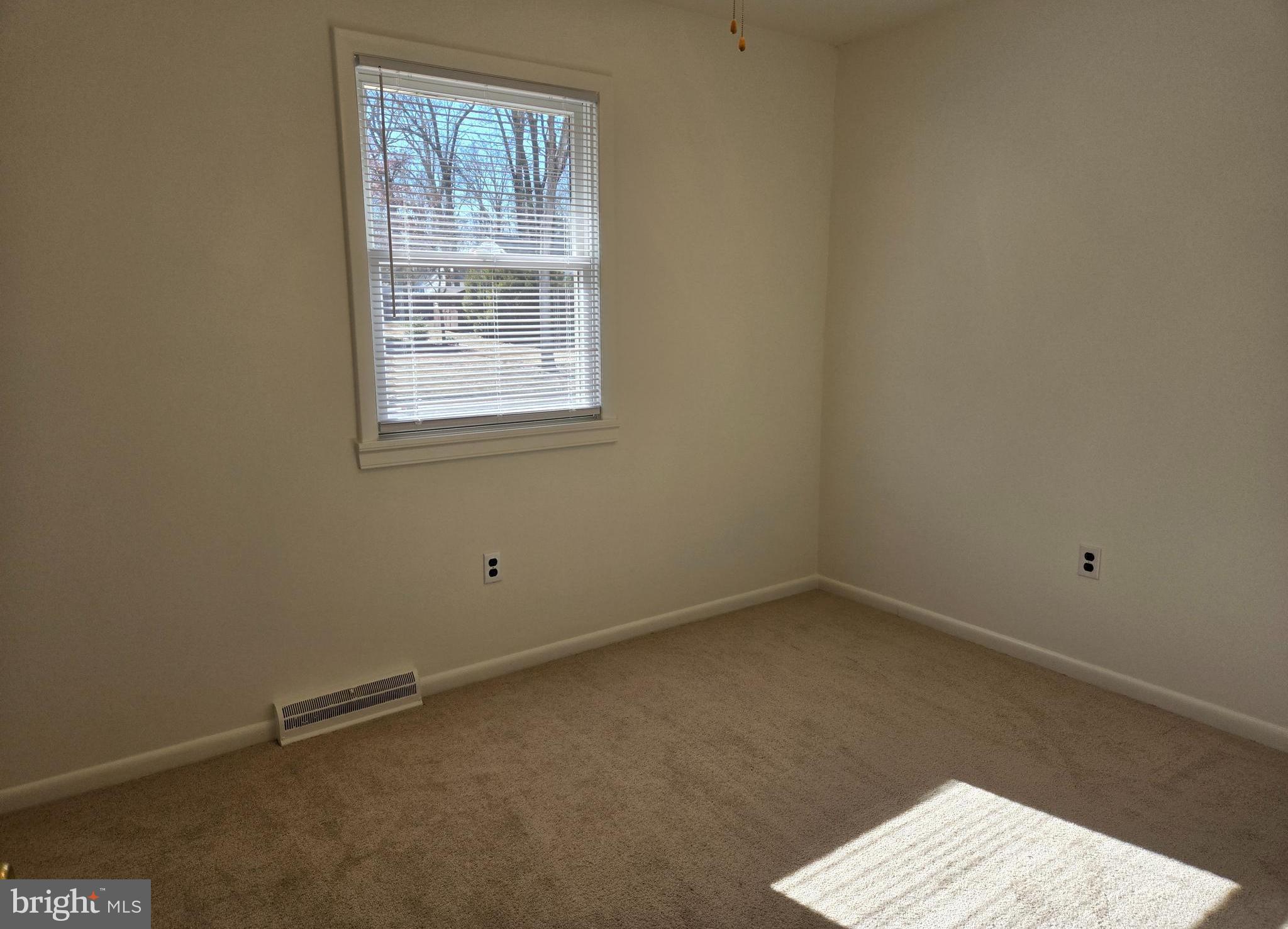8 Sandy Drive Newfield, NJ 08344 - Photo 14 of 48 an empty room with a window