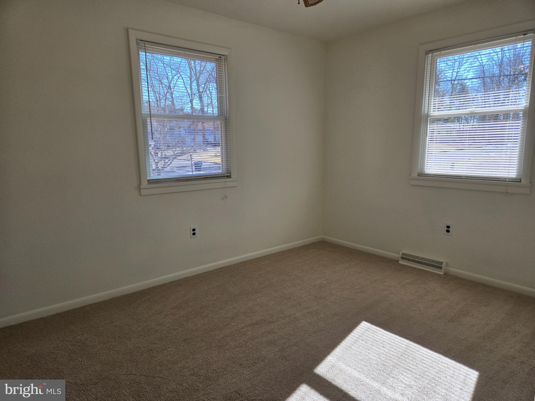 8 Sandy Drive Newfield, NJ 08344 - Photo 15 of 48 an empty room with a window
