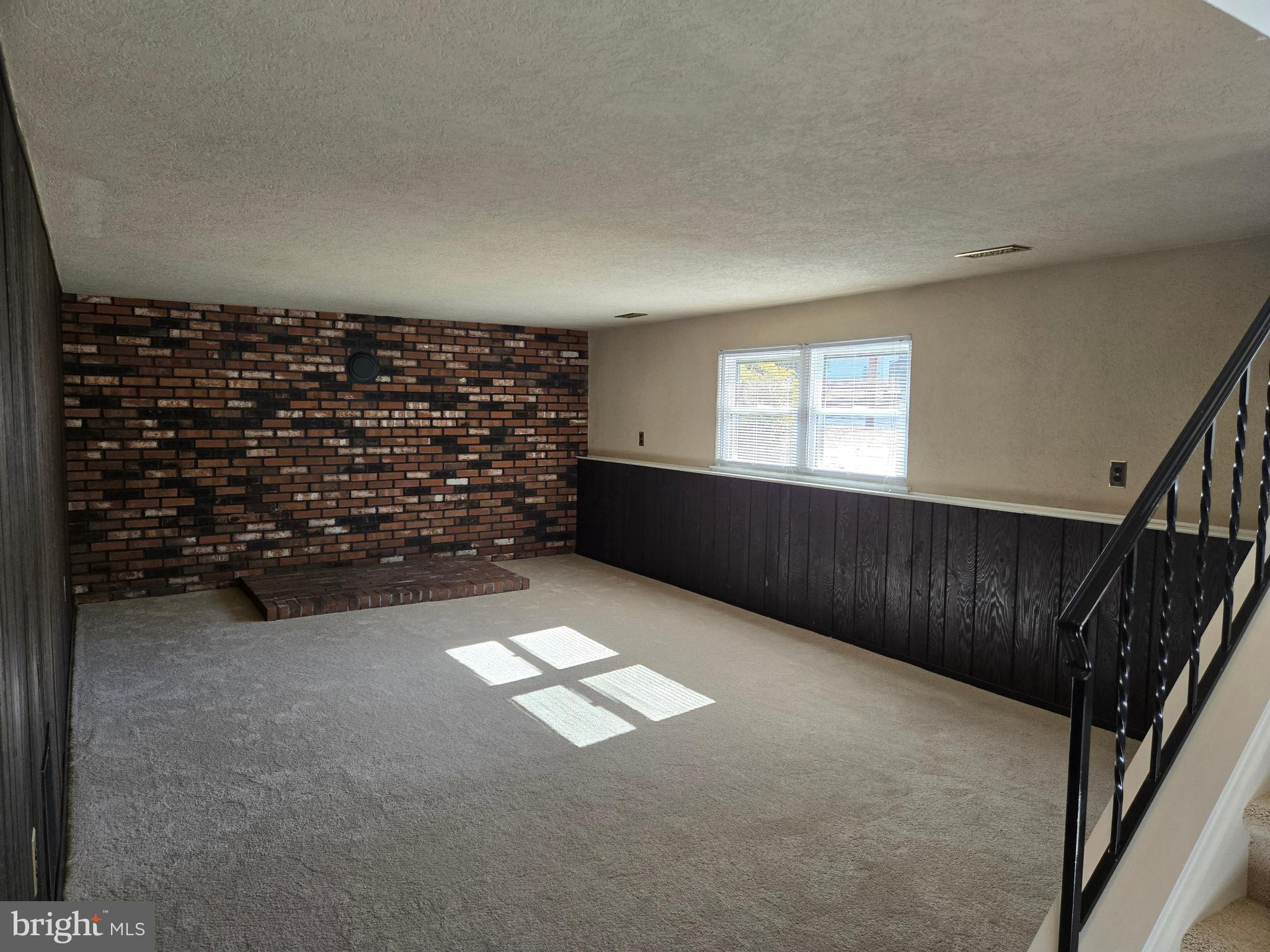 8 Sandy Drive Newfield, NJ 08344 - Photo 20 of 48 a view of an empty room and windows