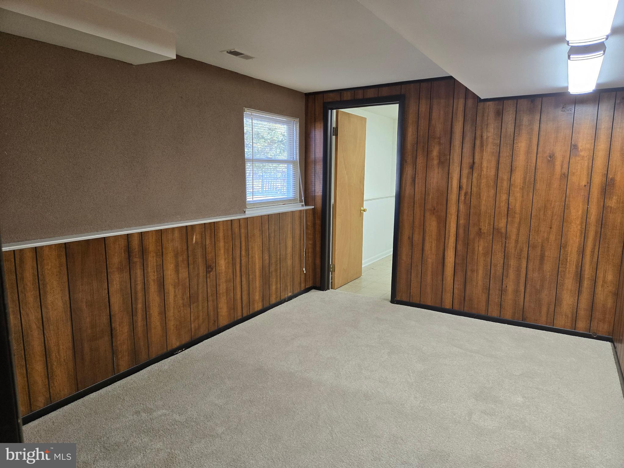 8 Sandy Drive Newfield, NJ 08344 - Photo 21 of 48 a view of an empty room with wooden floor