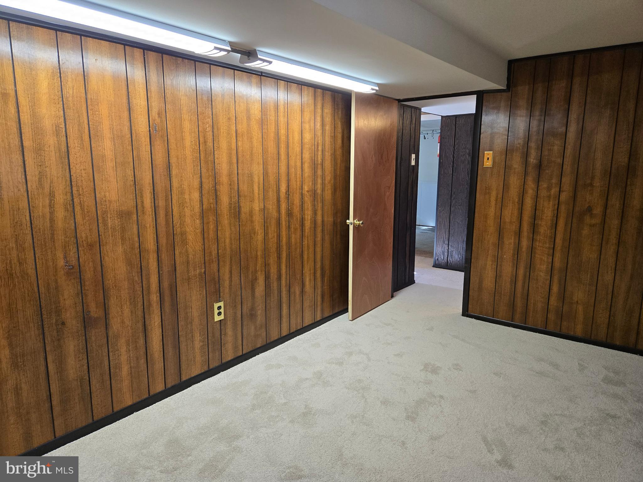 8 Sandy Drive Newfield, NJ 08344 - Photo 22 of 48 a view of a elevator with wooden walls