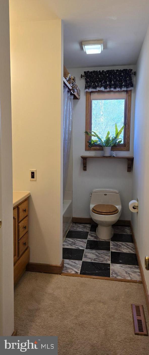 8 Sandy Drive Newfield, NJ 08344 - Photo 24 of 48 a bathroom with a toilet