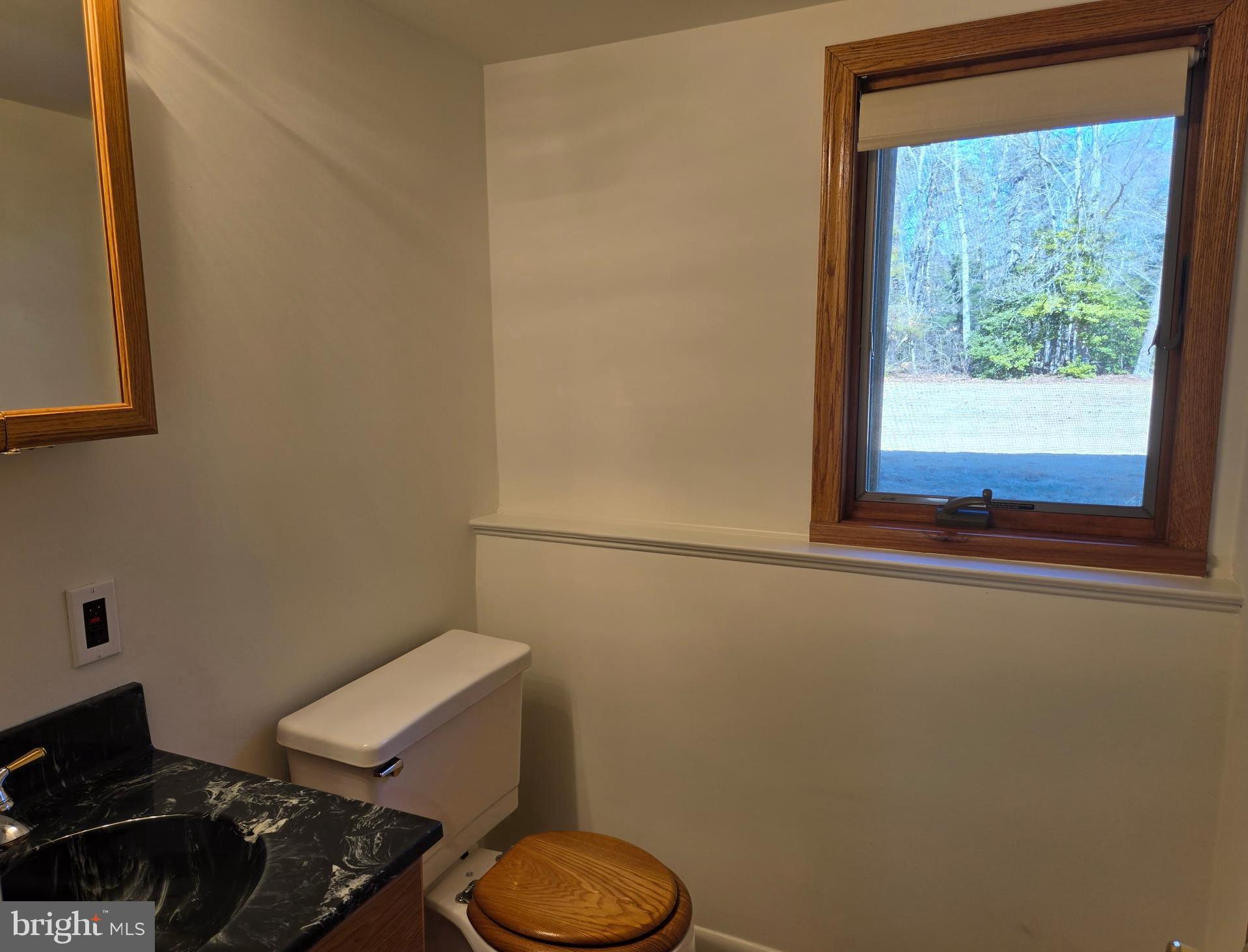 8 Sandy Drive Newfield, NJ 08344 - Photo 27 of 48 a bathroom with a toilet