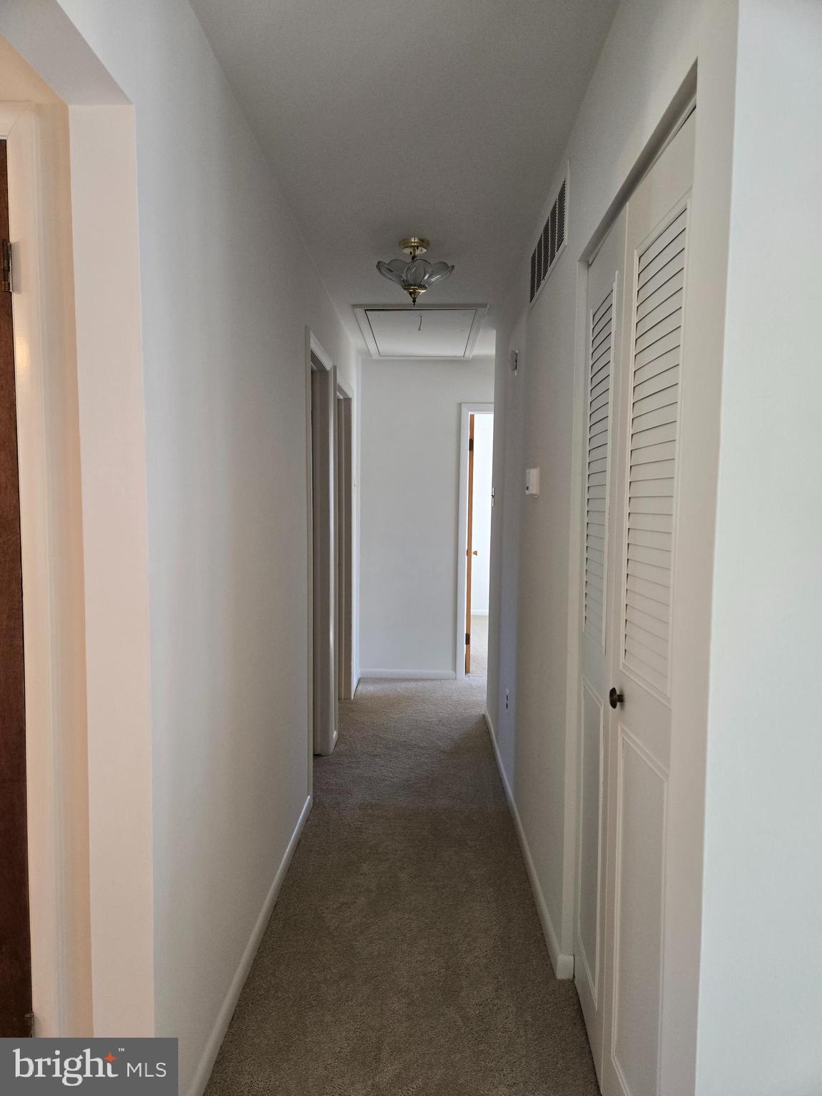 8 Sandy Drive Newfield, NJ 08344 - Photo 28 of 48 a view of a hallway to a bedroom