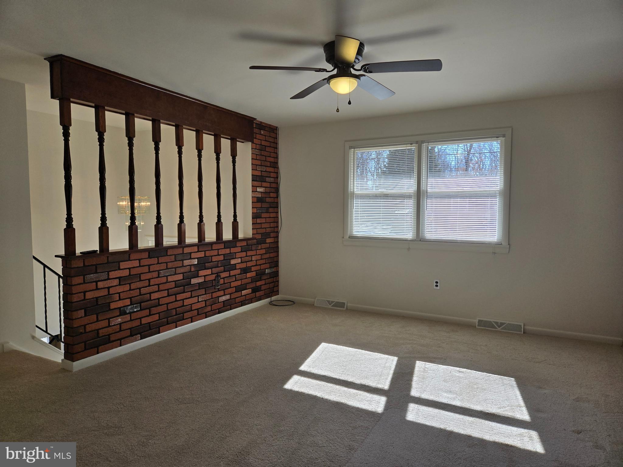 8 Sandy Drive Newfield, NJ 08344 - Photo 3 of 48 a view of an empty room with a window