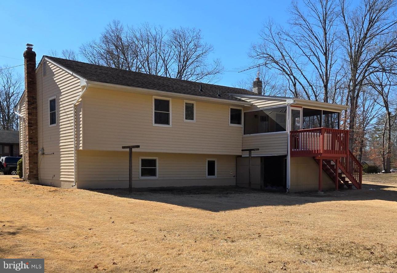 8 Sandy Drive Newfield, NJ 08344 - Photo 37 of 48 a front view of a house with a yard