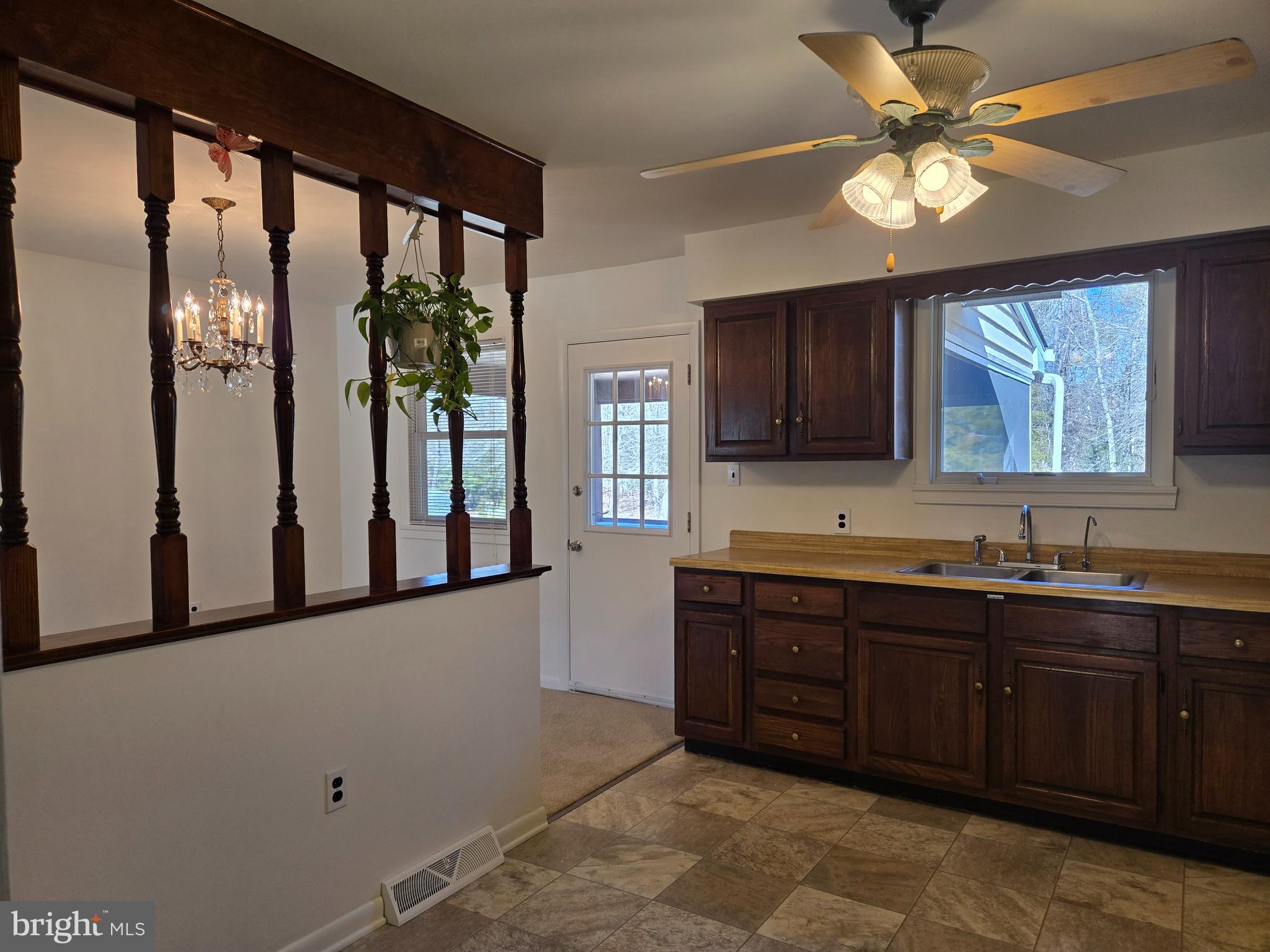 8 Sandy Drive Newfield, NJ 08344 - Photo 8 of 48 a kitchen with a sink and cabinets