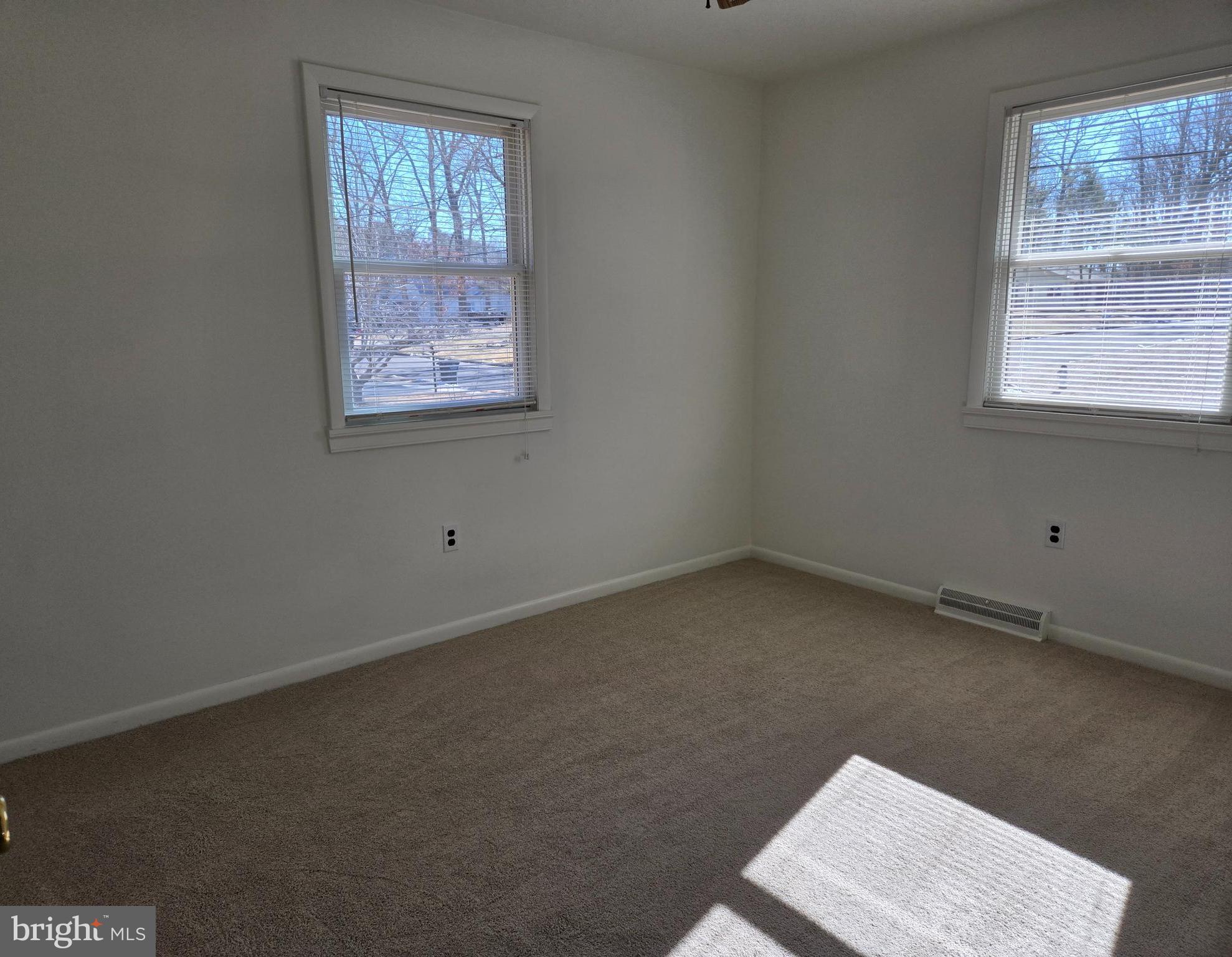 8 Sandy Drive Newfield, NJ 08344 - Photo 10 of 48 an empty room with a window