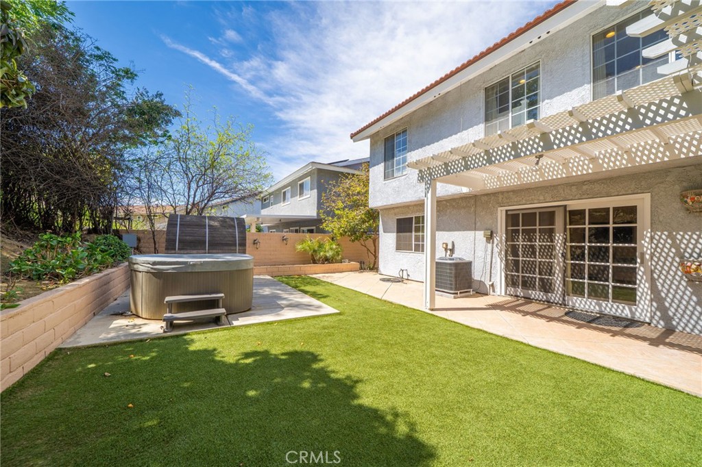 23472 Stirrup Drive Diamond Bar, CA 91765 - Photo 7 of 7 a front view of a house with a yard and garage