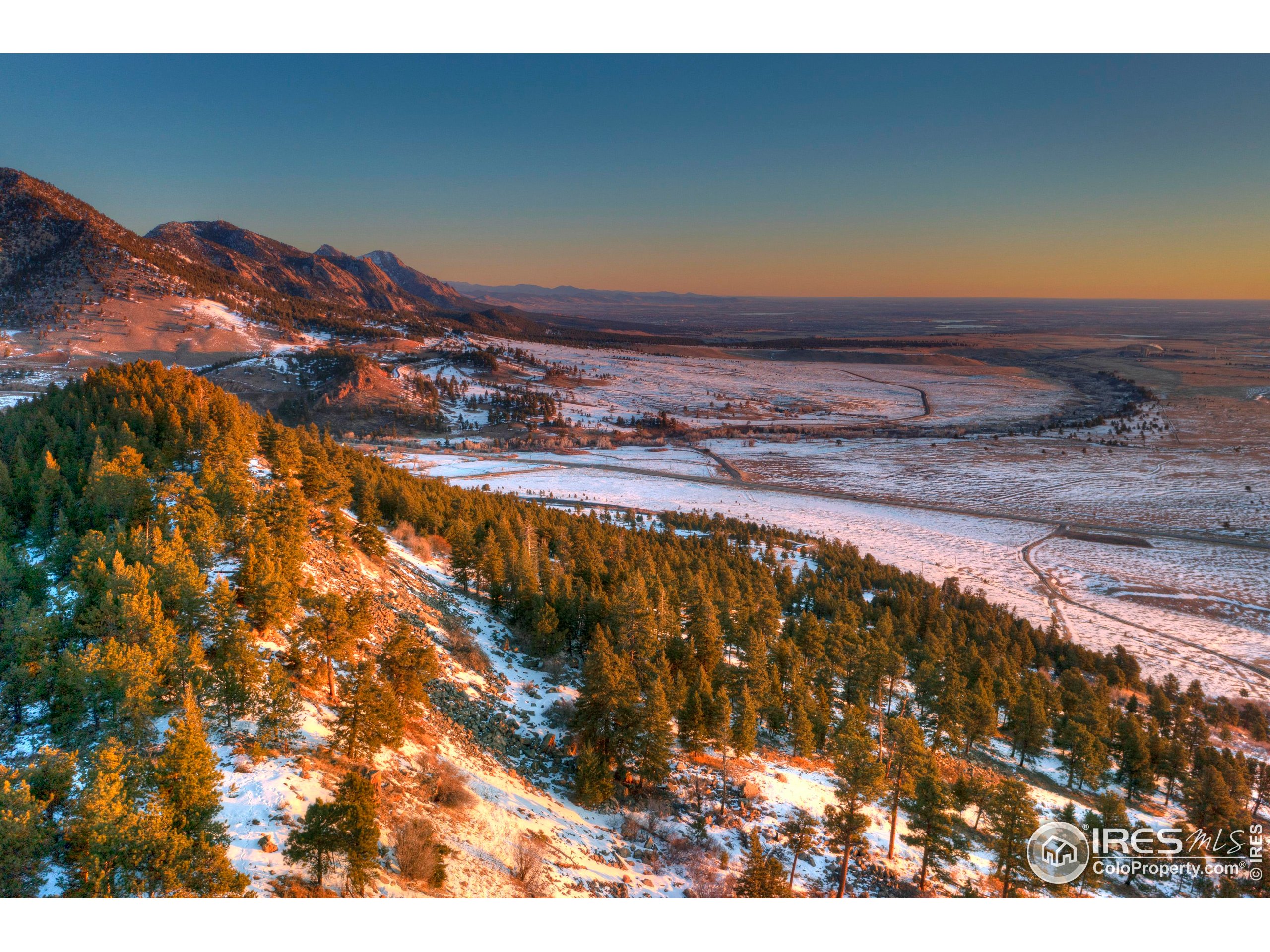 a view of water heater and wooden floor