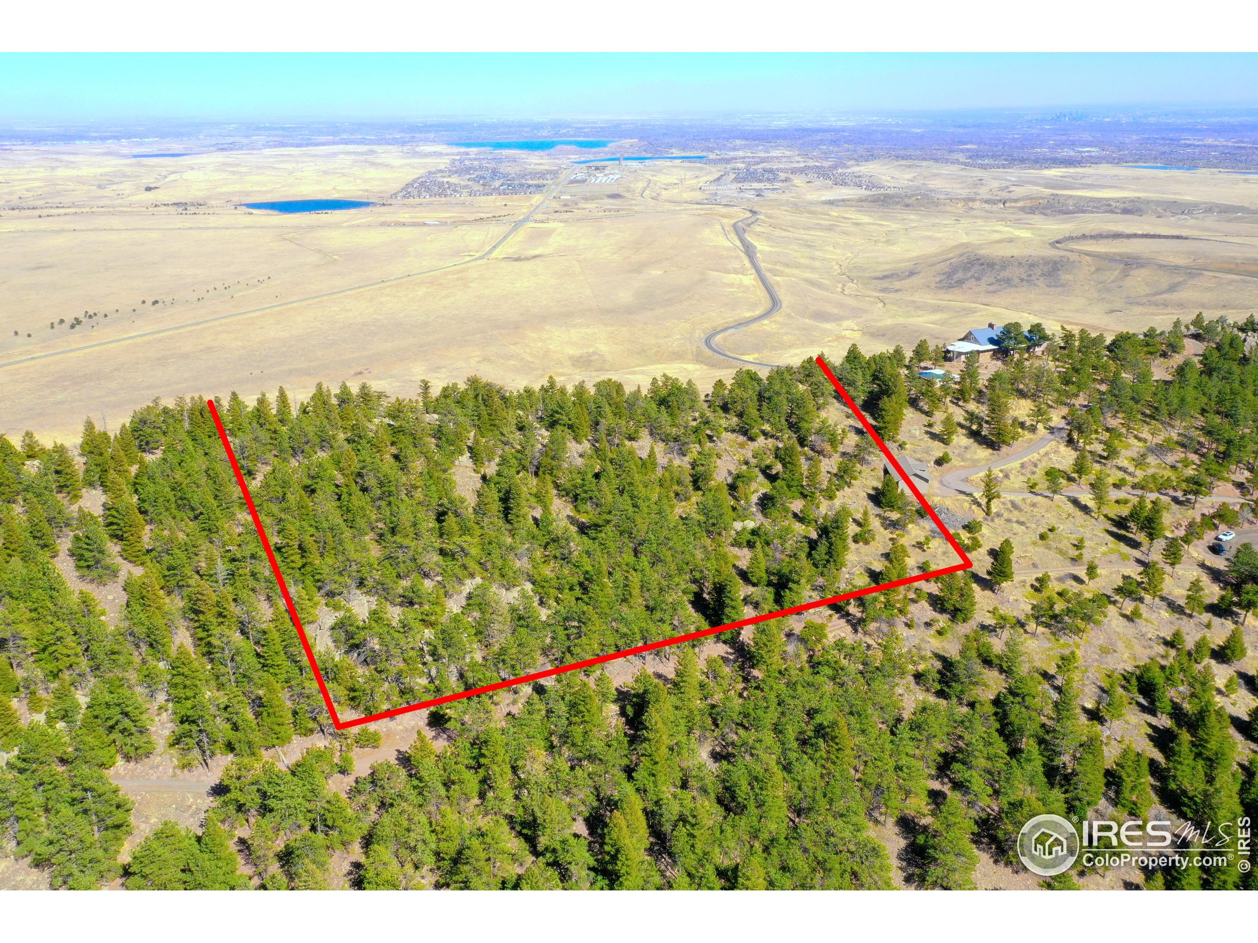 9352 Eastridge Road Golden, CO 80403 - Photo 12 of 23 a view of an ocean and beach