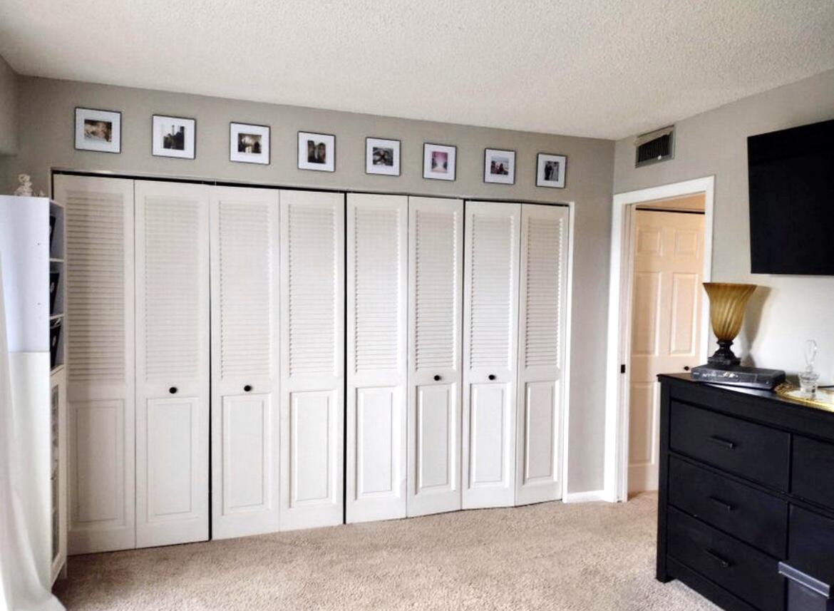 209 Suffolk F, Unit 209 Boca Raton, FL 33434 - Photo 17 of 21 a view of a hallway with closet