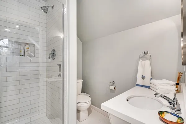 a bathroom with a sink and a toilet