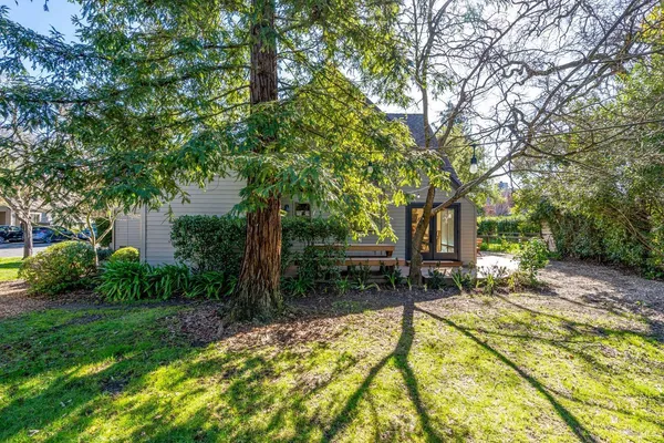 a view of a backyard with a patio