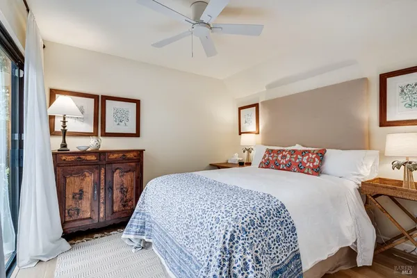 a bedroom with a sink and a dresser