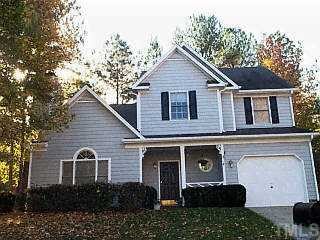 5401 Fairbridge Road Raleigh, NC 27613 - Photo 1 of 1 a front view of a house with a garden