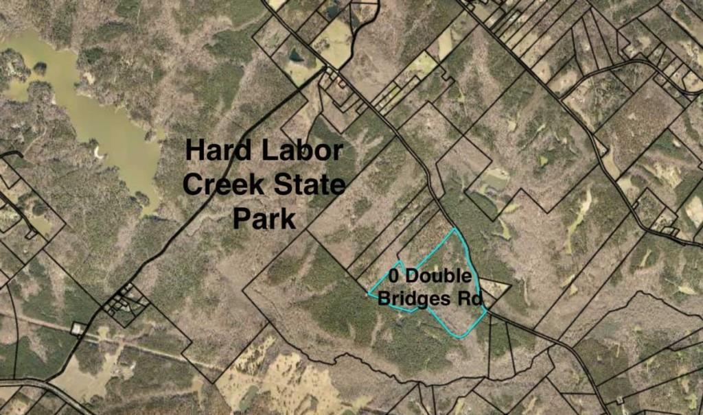 0 Double Bridges Road Madison, GA 30650 - Photo 20 of 20 a street sign sitting on a road