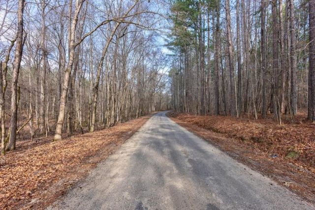 a view of a backyard of the house