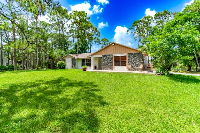 $695,000 | 15211 60th Place North, Loxahatchee, FL 33470