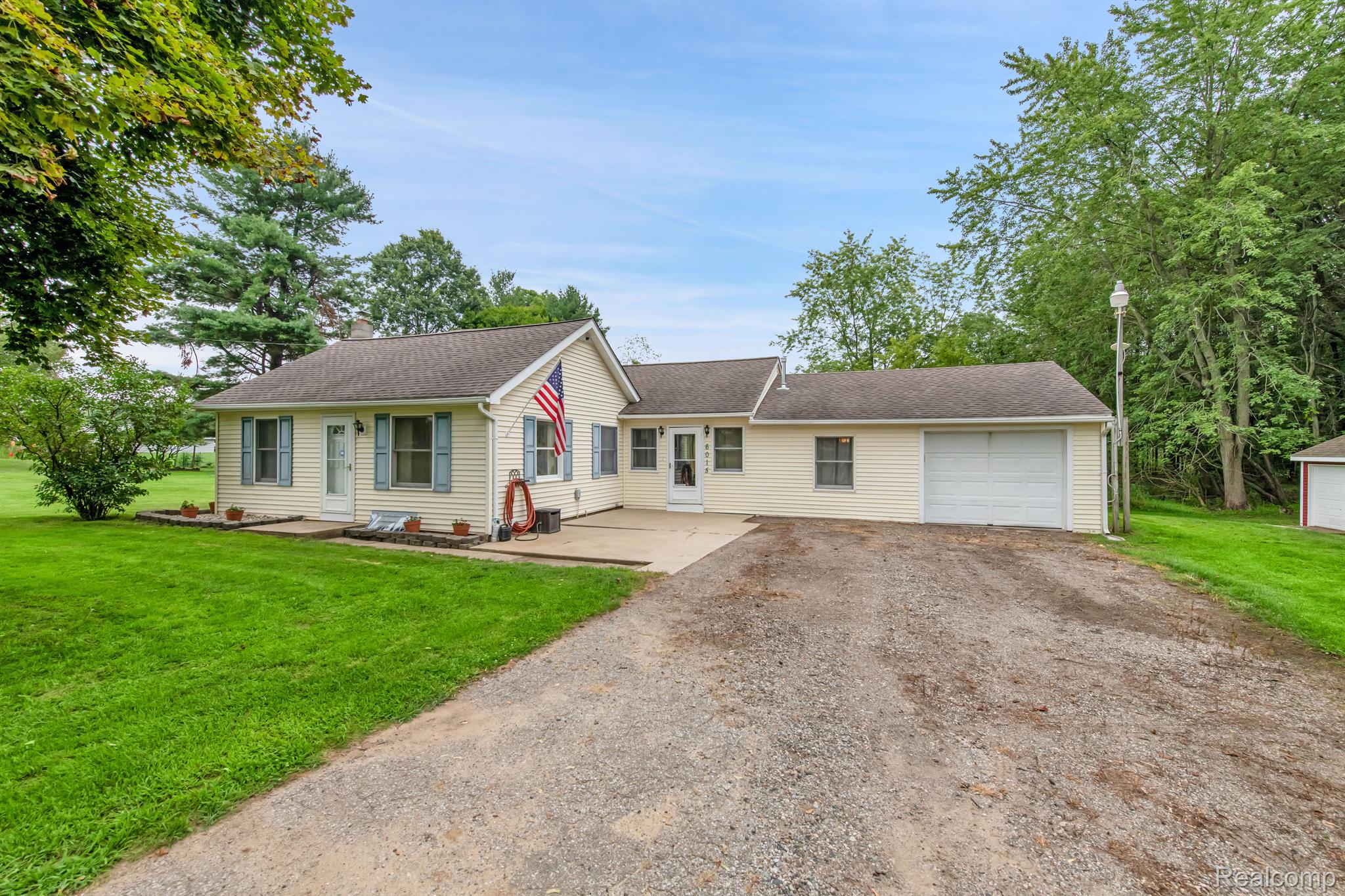 6015 Rives Junction Road Jackson, MI 49201 - Photo 5 of 35 FRONT VIEW WITH PORCH, ENTRY PATIO OFF DRIVEWAY