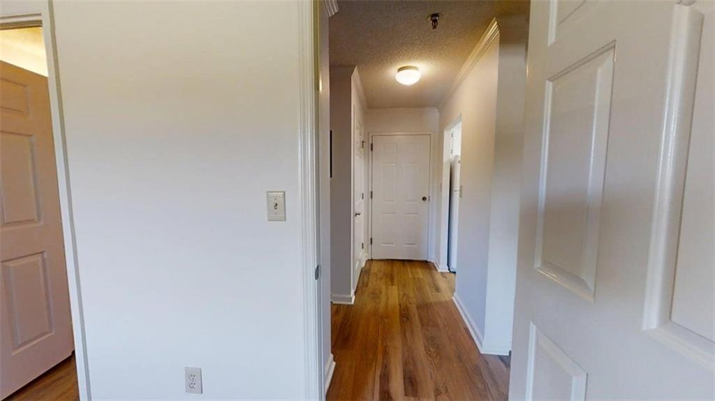 300 Johnson Ferry Road, Unit B409 Atlanta, GA 30328 - Photo 15 of 40 a bathroom with a shower and a mirror