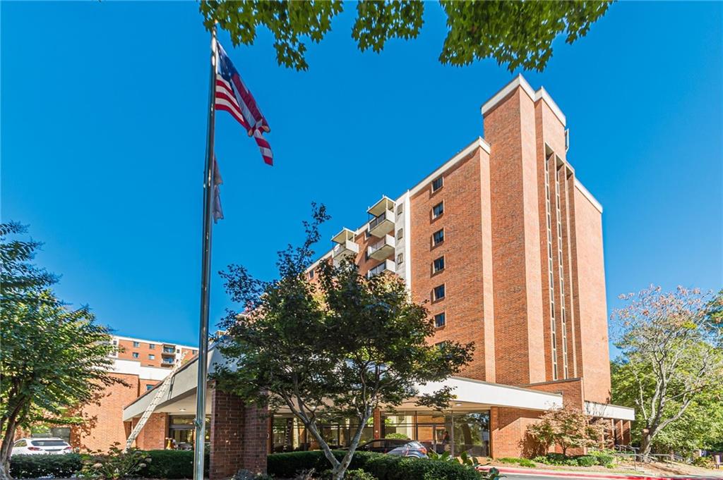 300 Johnson Ferry Road, Unit B409 Atlanta, GA 30328 - Photo 2 of 40 a view of balcony with a tree