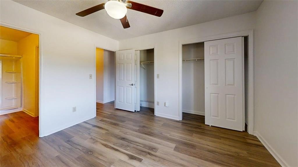 300 Johnson Ferry Road, Unit B409 Atlanta, GA 30328 - Photo 26 of 40 a view of empty room with wooden floor