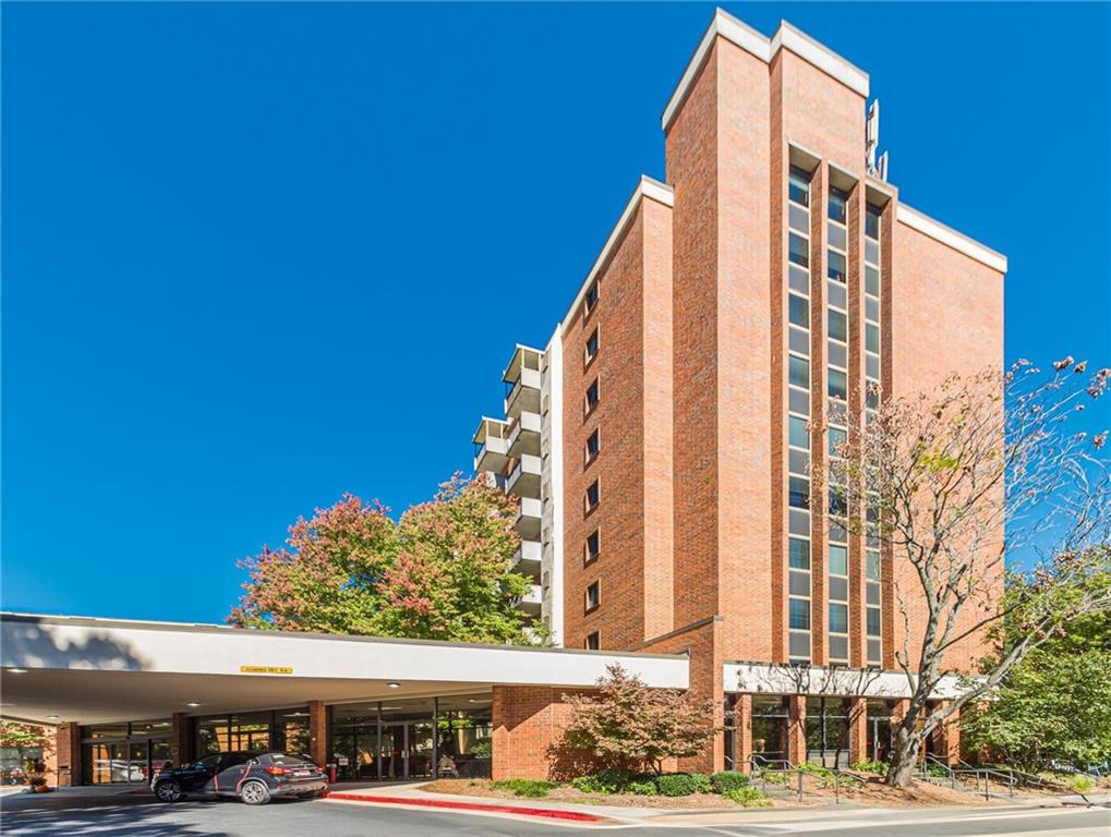 300 Johnson Ferry Road, Unit B409 Atlanta, GA 30328 - Photo 3 of 40 a front view of a building with street