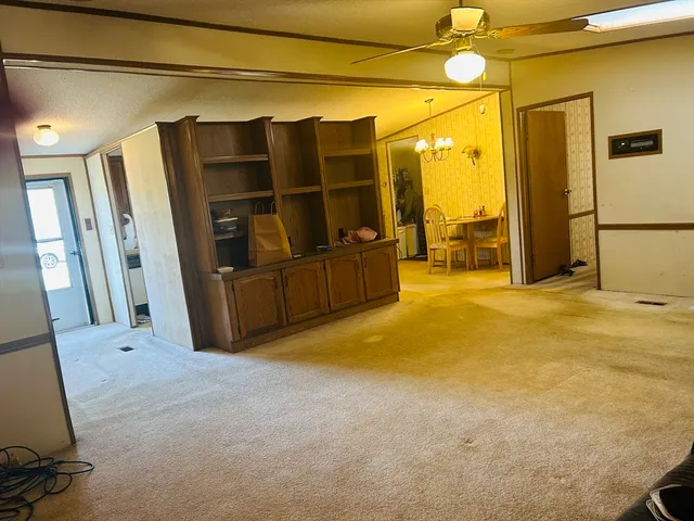 a bedroom with a bed and a shower