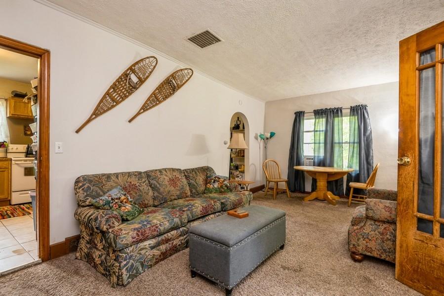 6180 Long Road Three Oaks, MI 49128 - Photo 11 of 26 06_6180LongRd_91_KitchenLivingRoom_LowRe