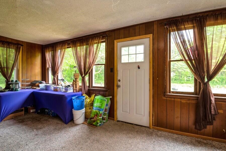6180 Long Road Three Oaks, MI 49128 - Photo 13 of 26 08_6180LongRd_97_SunRoom_LowRes