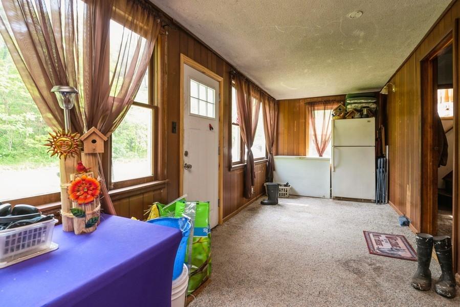 6180 Long Road Three Oaks, MI 49128 - Photo 14 of 26 09_6180LongRd_97001_Sunroom_LowRes