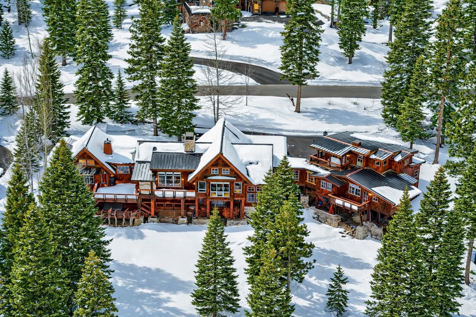 2221 Silver Fox Truckee, CA 96161 - Photo 1 of 27 an aerial view of a house with swimming pool and garden