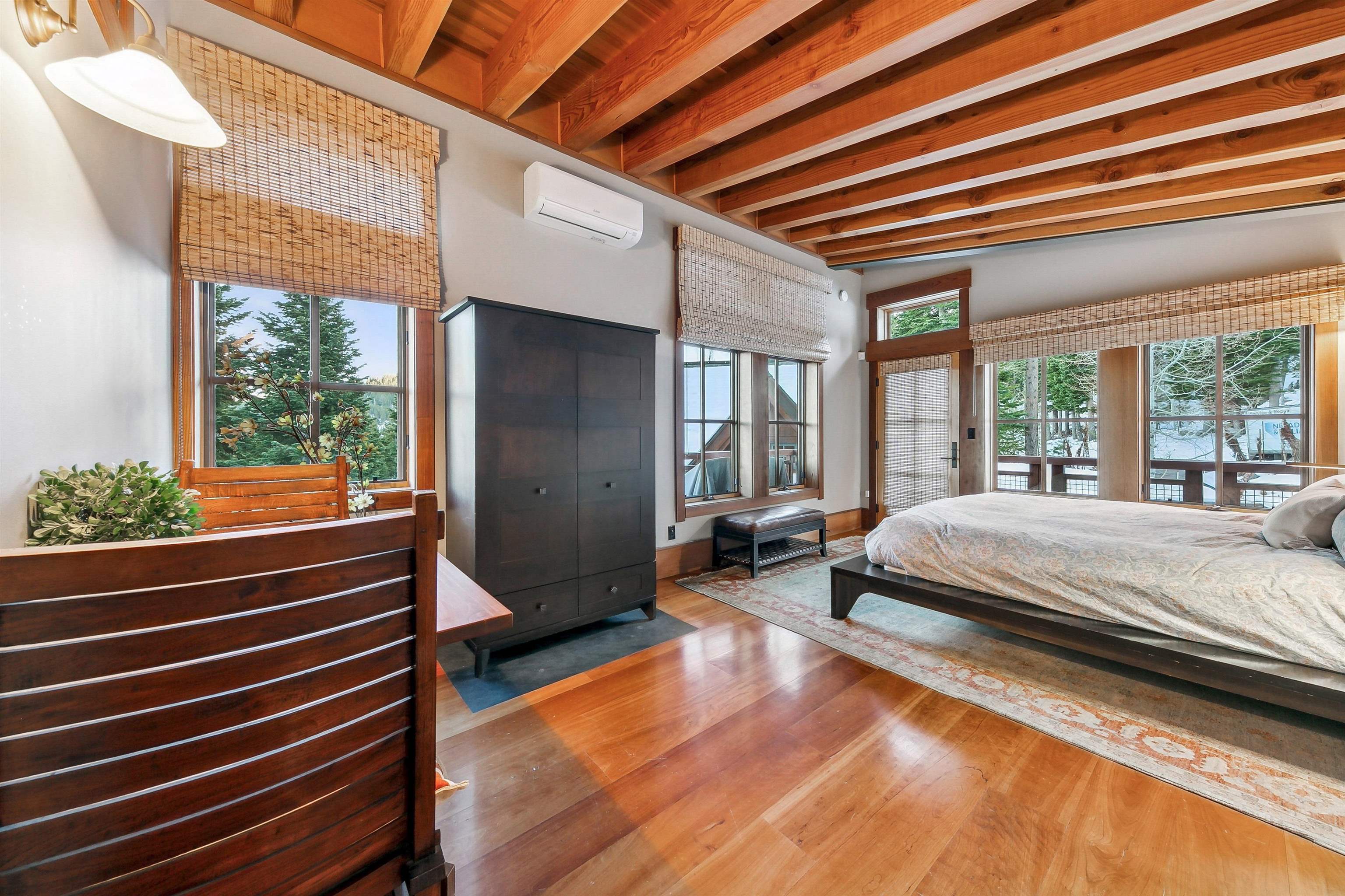 2221 Silver Fox Truckee, CA 96161 - Photo 18 of 27 a spacious bedroom with a bed and a balcony