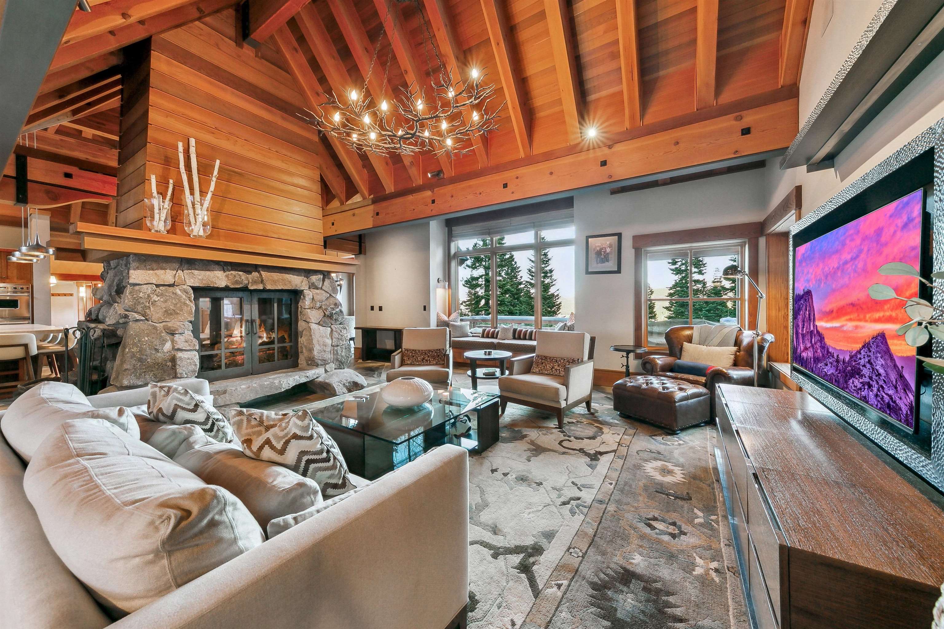 2221 Silver Fox Truckee, CA 96161 - Photo 7 of 27 a living room with furniture a rug and a flat screen tv