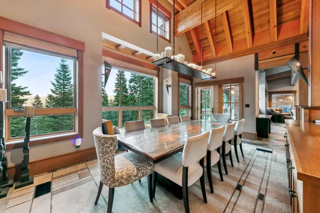 a view of a patio with a table and chairs