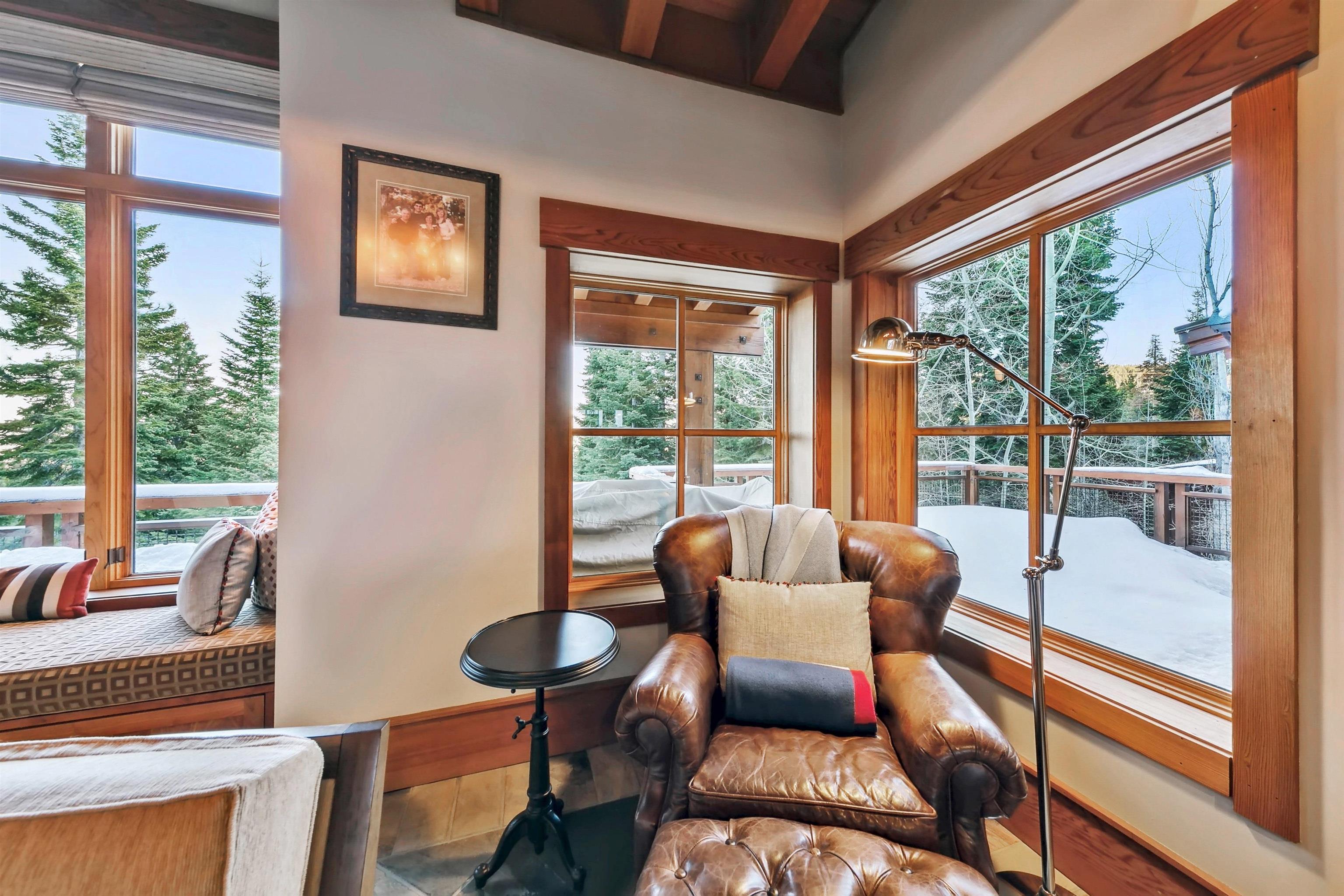 2221 Silver Fox Truckee, CA 96161 - Photo 8 of 27 a living room with furniture and a floor to ceiling window