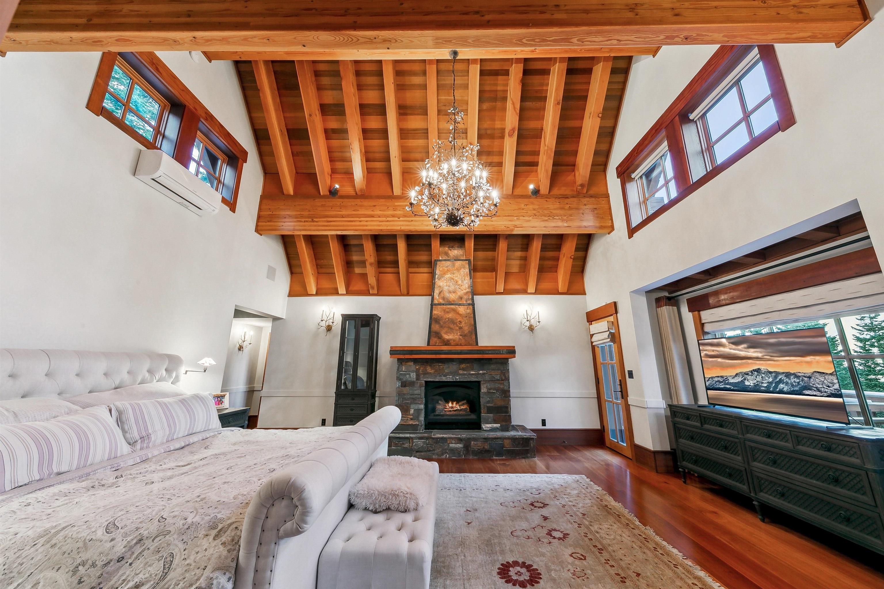 2221 Silver Fox Truckee, CA 96161 - Photo 10 of 27 a living room with fireplace furniture and a flat screen tv