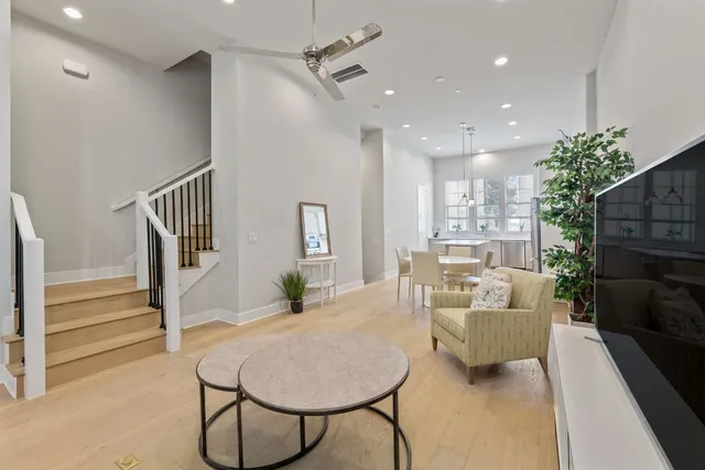a living room with furniture and a table
