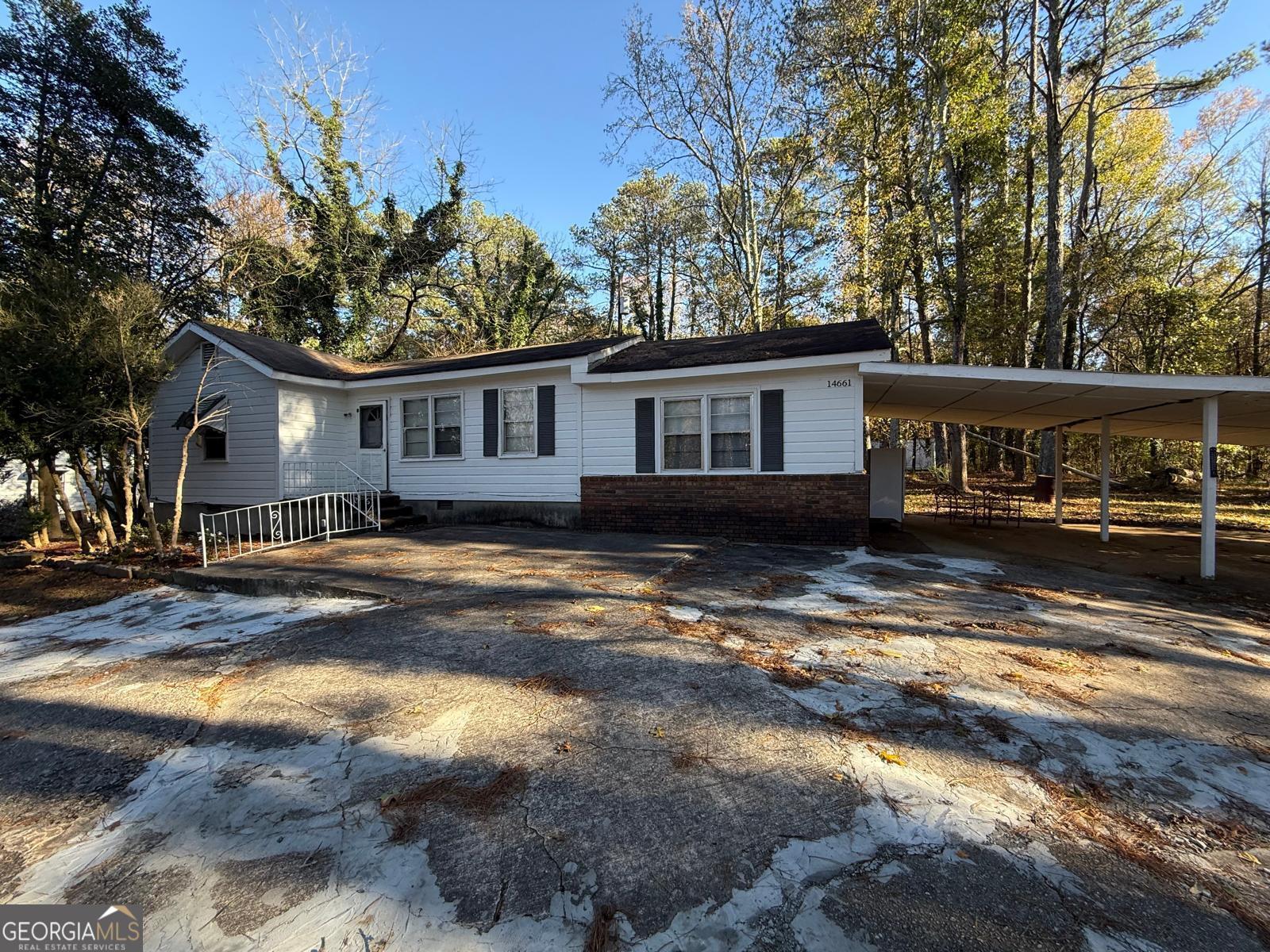 14661 Veterans Memorial Highway Villa Rica, GA 30180 - Photo 1 of 14 a view of a house with a yard