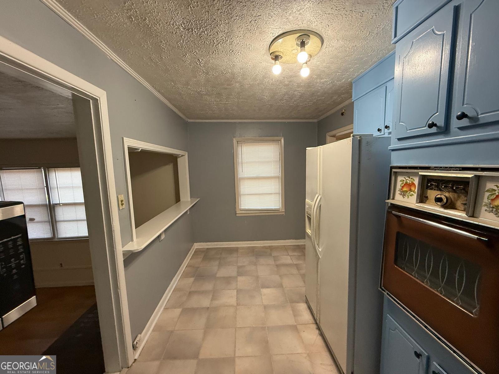 14661 Veterans Memorial Highway Villa Rica, GA 30180 - Photo 4 of 14 a view of an empty room with a fireplace