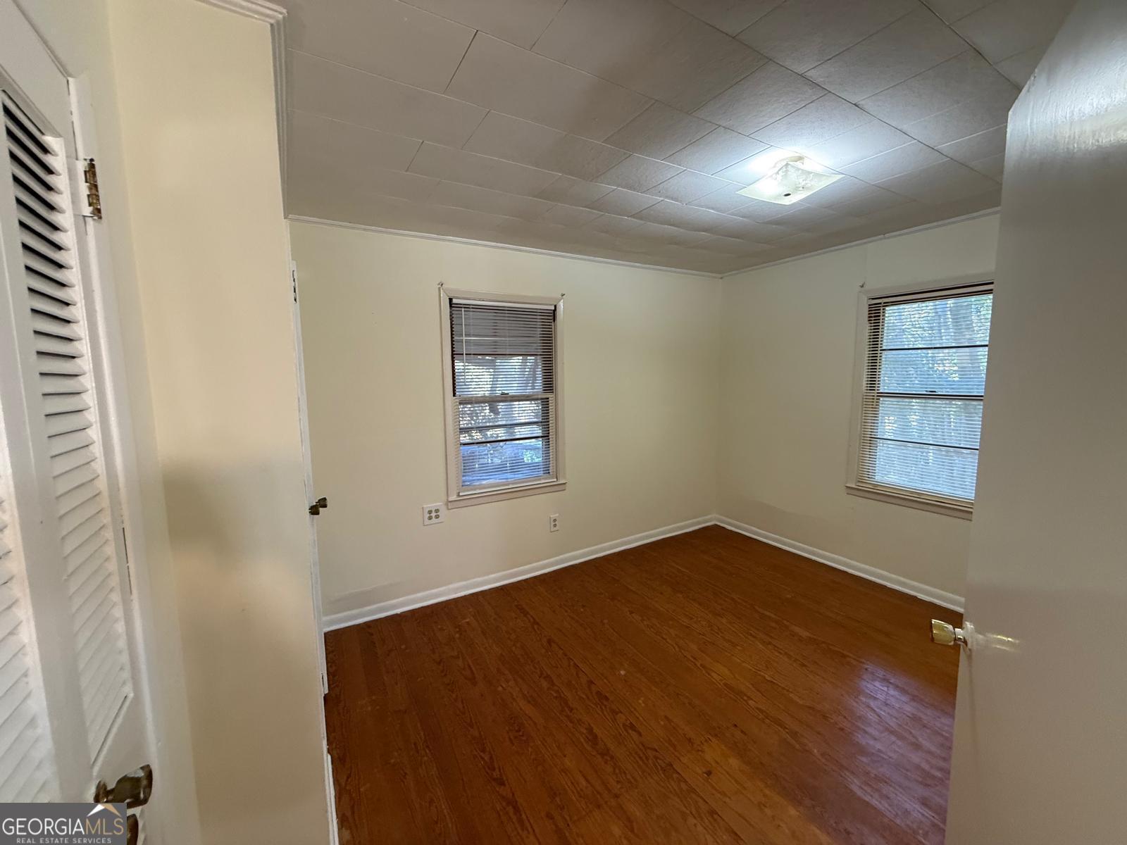 14661 Veterans Memorial Highway Villa Rica, GA 30180 - Photo 8 of 14 an empty room with windows