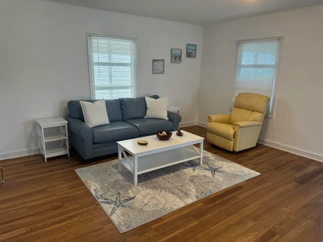 a bedroom with a bed and dresser