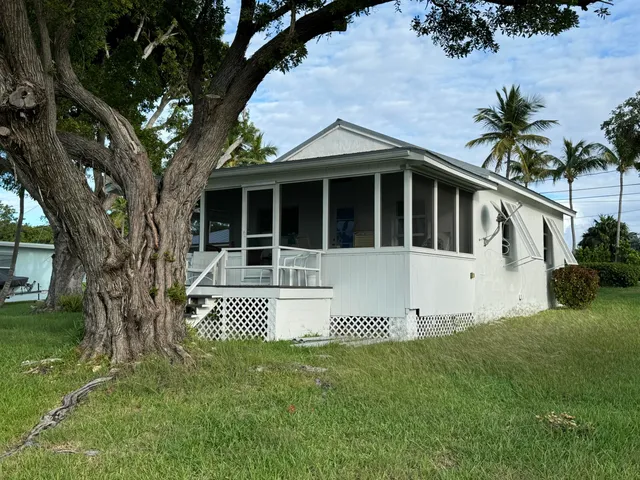 a view of a back yard of the house