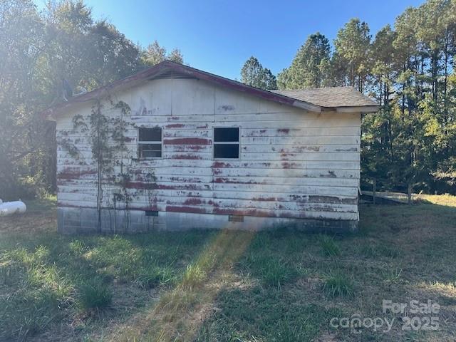 1424 Jj Autry Road Marshville, NC 28103 - Photo 4 of 12 a view of a wooden house with a yard