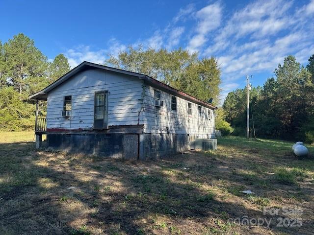 1424 Jj Autry Road Marshville, NC 28103 - Photo 5 of 12 a view of a house with a yard