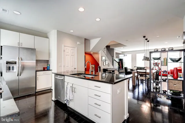 a bed room with a bed and a large window